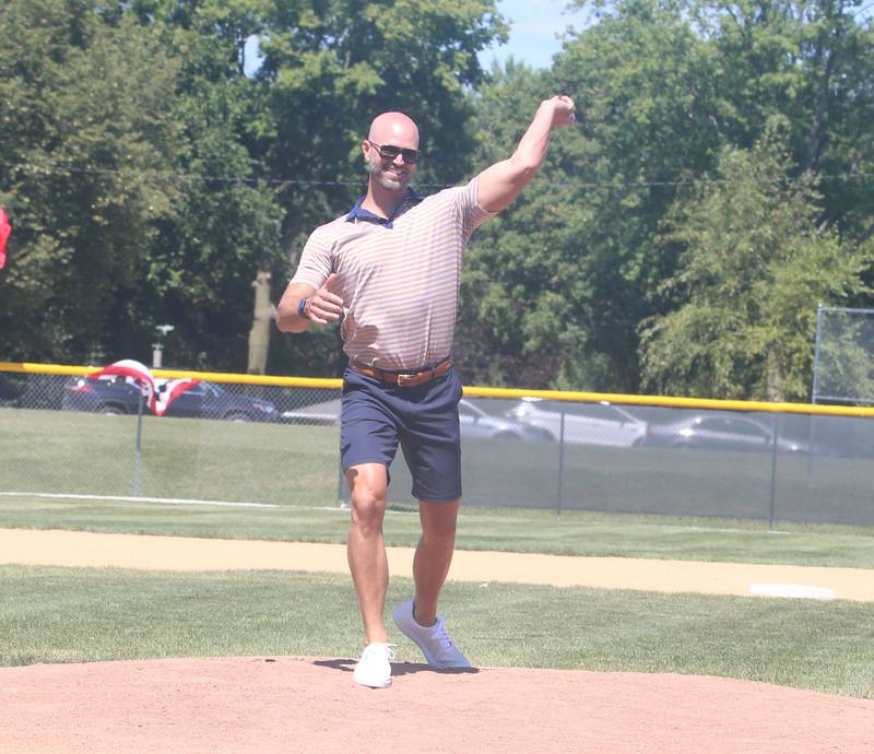 Former Major League Baseball pitcher J.A. Happ throws out the first pitch of the St. Bede alumni game during the J.A. Happ Day and field dedication on Sunday, July 30, 2023 at Washington Park in Peru.
