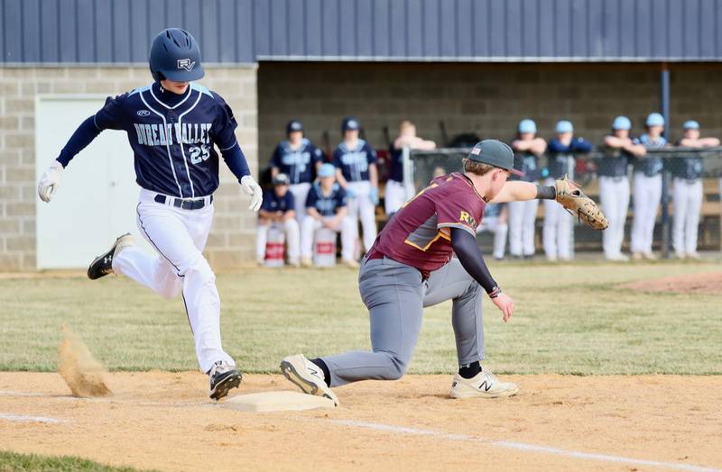 Bureau Valley senior Tyler Birkey tries to beat the throw to first base against ROWVA in Tuesday's season-opener in Manlius. The visiting Cougars won 5-1.