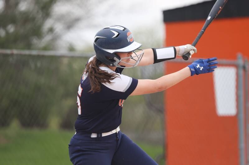 Oswego’s Rikka Ludvigson connects against Minooka on Wednesday, April 17, 2024 in Minooka.