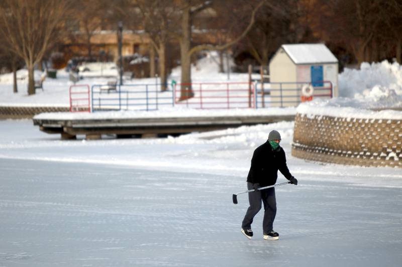 Tom Edwards of Batavia was one of the first onto the ice at the Batavia Depot Pond after several days of sub-freezing weather. The Batavia Park District declares the ice safe for skating once it reaches eight inches or greater of ice.
