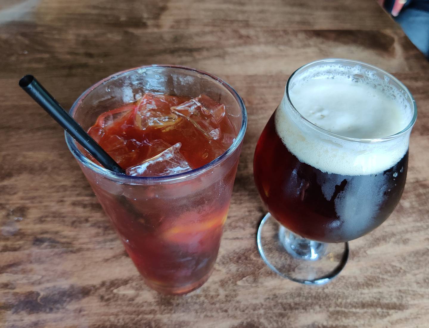 An iced tea and a red ale from Ireland on tap at The Office in St. Charles.