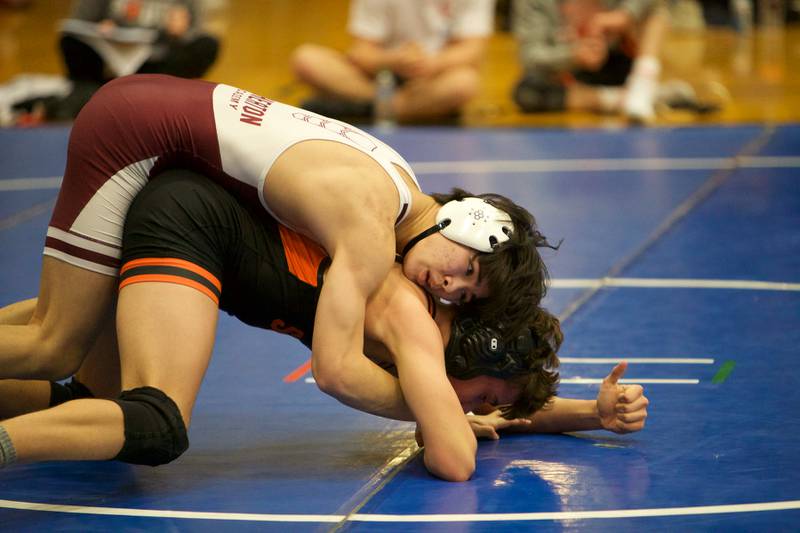 Wheaton Warrenville South's Joey Simon  competes with Wheaton Academy's Oscar Smith in the 132 lb. class at the Newbill Invitational on Saturday, Jan.6,2024 in Geneva.