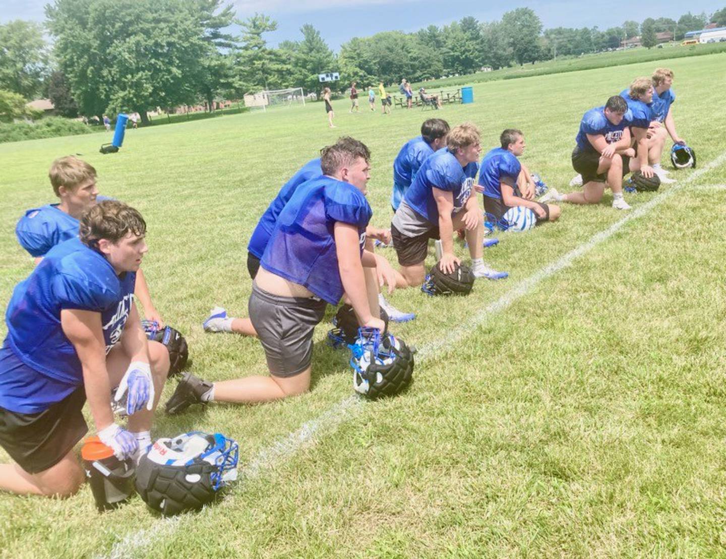 The Princeton Tigers tried to take a break from the heat during Thursday's controlled scrimmage with East Peoria.
