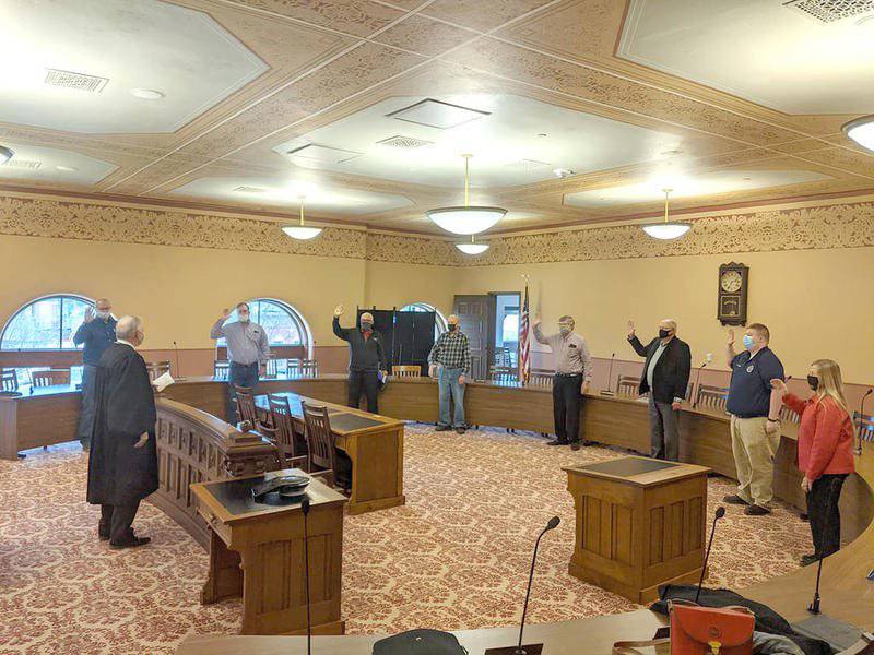 Judge Robert T. Hanson swore in the Ogle County Board members elected in the General Election on Monday. They include Dan Miller, David Williams, Tom Smith, Larry Boes, Don Griffin, John Finfrock, Zach Oltmanns and Marcia Heuer. Photo supplied