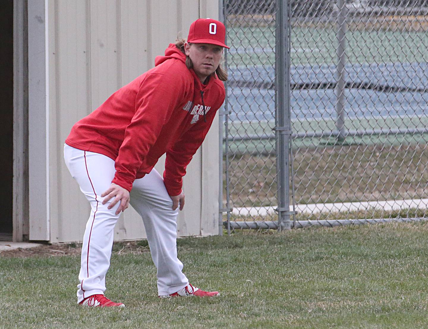 Ottawa head baseball coach Tyler Wargo coaches his team against Serena on Tuesday, March 21, 2023 at Ottawa High School.