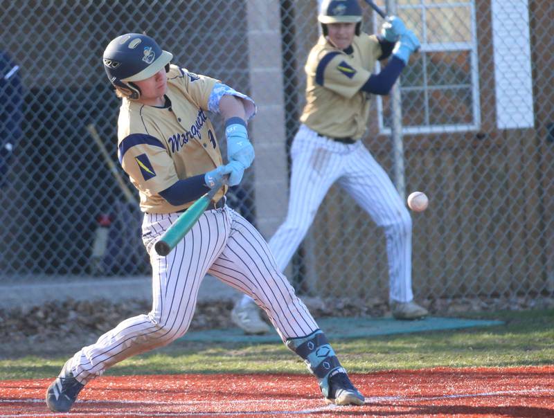 Marquette's Jaxsen Higgins gets a hit against Newark on Monday, March 23, 2026 at Newark High School.
