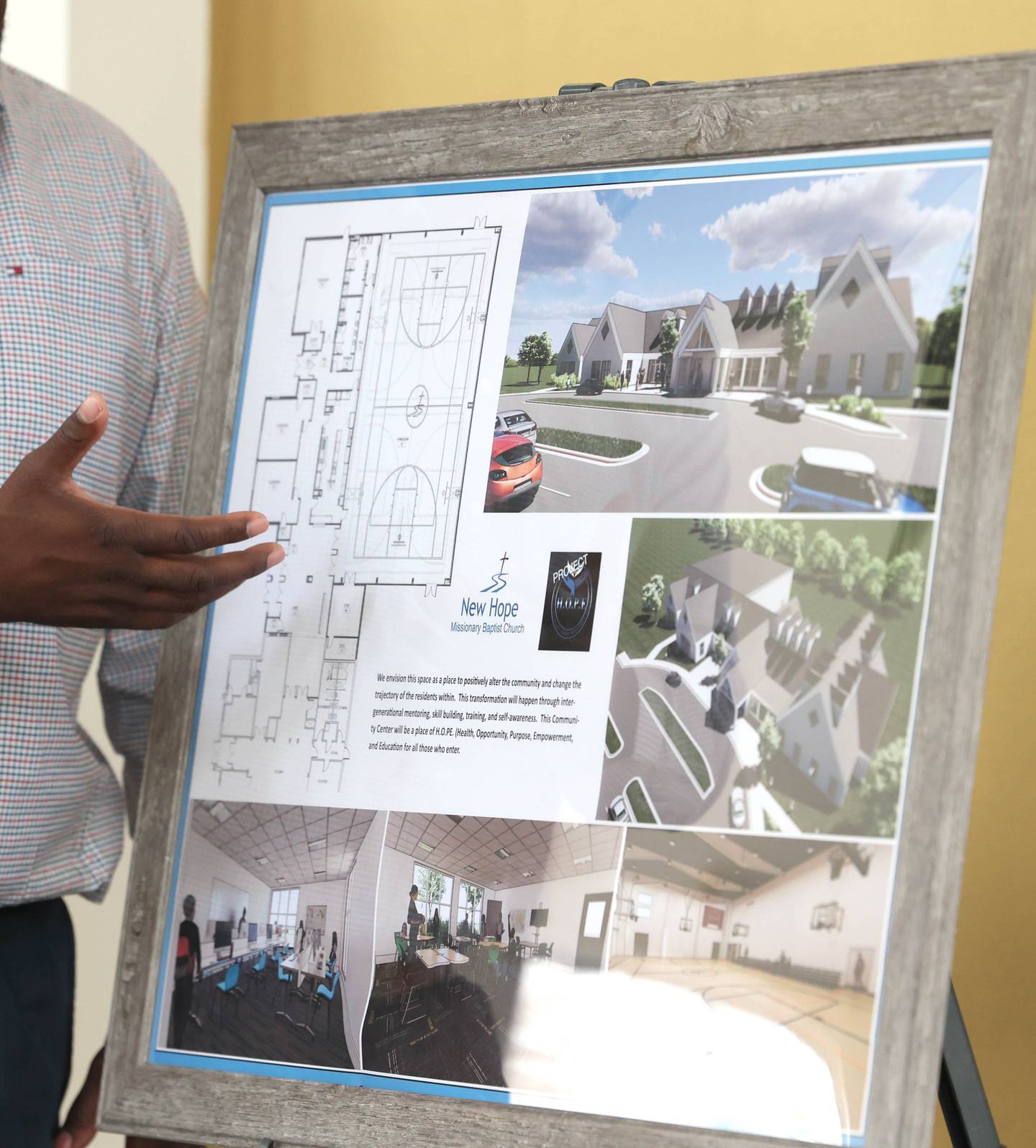 New Hope Missionary Baptist Church Pastor Joe Mitchell talks Friday, Feb. 24, 2023, at the church in DeKalb, about the plans for a community center addition at the church.