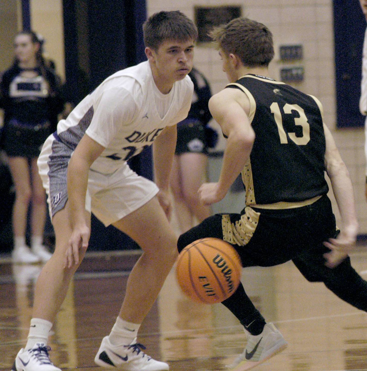 Sycamore player Xander Lewis brings the ball up court against  Dixon's Cameron Folker . The Dixon Dukes hosted  the Sycamore Spartans in a non-conference game  on Friday, December 19th, 2025.