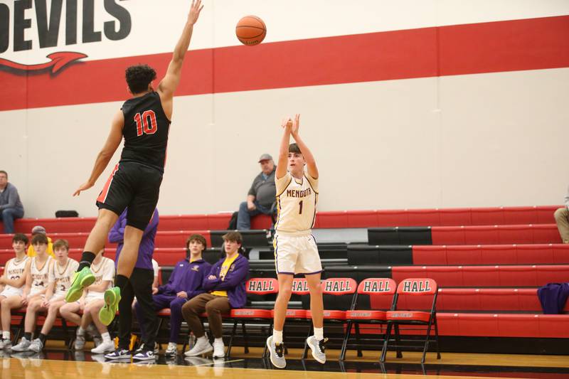 Mendota's Cale Strouss shoots a wide-open jump shot over Stillman Valley's Fadi Zatar during the 49th annual Colmone Classic Tournament on Wednesday, Dec. 6, 2023 at Hall High School.