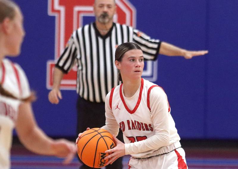 Huntley’s Aubrina Adamik moves the ball against Hononegah in girls basketball at Dundee-Crown High School in Carpentersville on Tuesday, November 25, 2025.