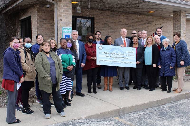 U.S. Rep. Bill Foster presented the Will-Grundy Medical Clinic in Joliet with a $300,000 check on Tuesday, April 19, 2022, towards the renovation of the clinic’s building, which is located on 213 E. Cass St. in Joliet.