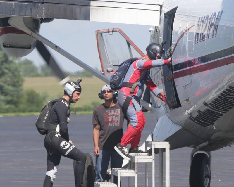 Skydivers board an airplane at Skydive Chicago on Monday, Aug. 22, 2022 in Ottawa.