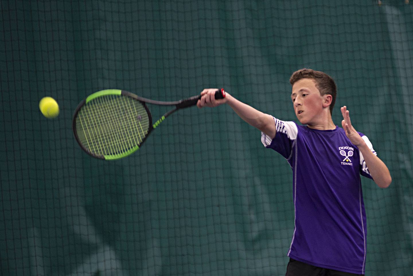 Dixon's Bashar Elbzour returns a shot to Sterling's Ethan Melcher Thursday, May 5, 2022 at Westwood in Sterling.