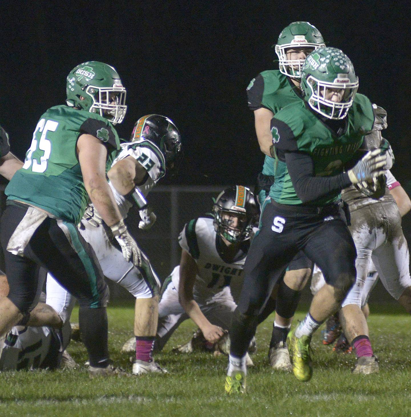Seneca’s Asher Hamby breaks through the Dwight defense on his way to score a touchdown  in the 1st quarter Friday at Seneca.