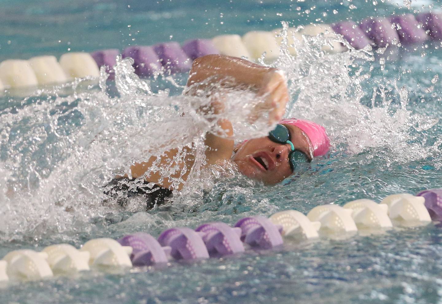 Morris's Caitlin Van Acker competes in the 200 yard freestyle relay on Tuesday, Oct. 8, 2024 at the Illinois Valley YMCA in Peru.