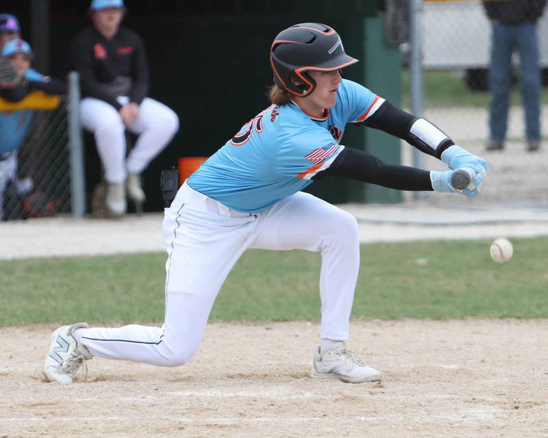 Sandwich's Nick Michalek lays down a bunt against Aurora Christian on Tuesday, April 1, 2025 in Sandwich.