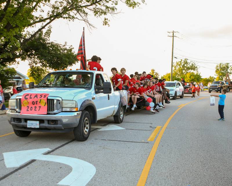 A young parade attendee excitedly waits for candy to be tossed to him during the Yorkville homecoming parade held on Thursday, Sept. 28, 2023.