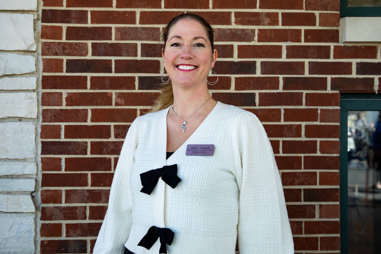 Will County Children's Advocacy Center, Assistant Director/Forensic Interviewer, Jaclyn Lundquist poses for a photo outside the new building on April 8, 2024.