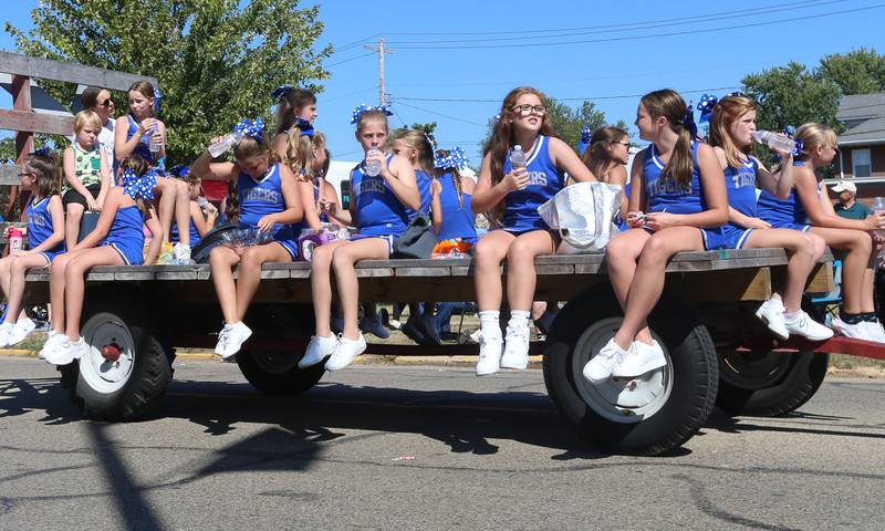 Princeton football cheerleaders ride on a float during the 52nd annual Homestead Festival parade on Saturday, Sept. 9, 2023 in Princeton.