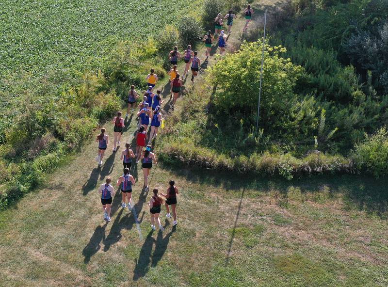 Girls cross country teams race during the Ottawa Nautical Mile Relay on Tuesday, Sept. 2, 2025 at Catlin Park in Ottawa.