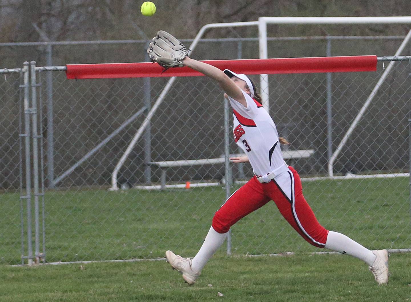 Streator's Mya Zavada makes a catch on the run against Peotone on Tuesday, April 4, 2023 in Streator.