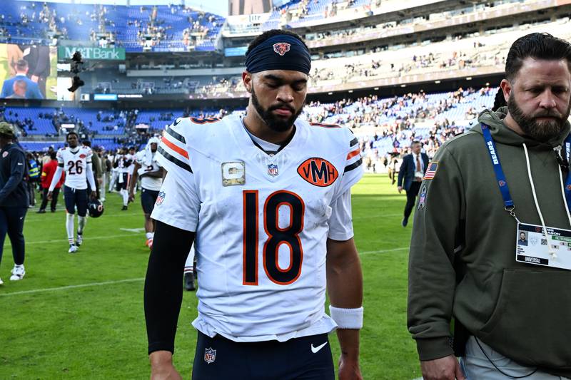 Chicago Bears quarterback Caleb Williams (18) walks off the field after an NFL football game against the Baltimore Ravens, Sunday, Oct. 26, 2025, in Baltimore. (AP Photo/Terrance Williams)