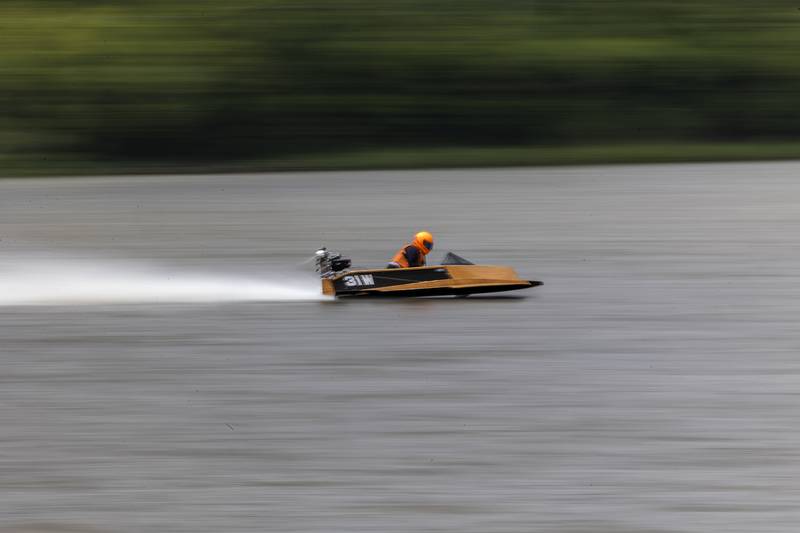 A driver speeds across the front straight-a-way Saturday, July 12, 2025, during a race at the Rock Falls River Chase.