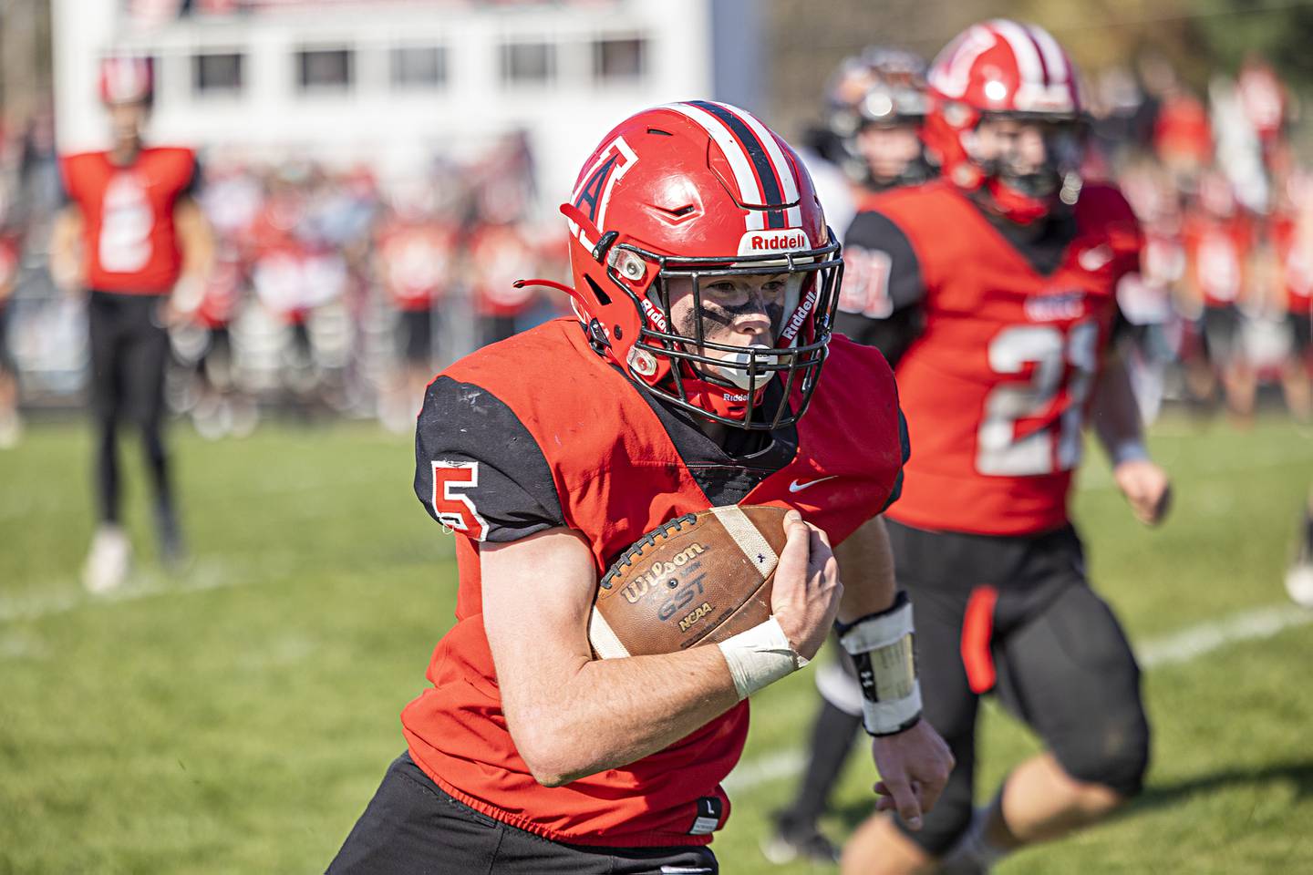 Amboy’s Landon Whelchel looks for running room against FCW Saturday, Nov. 4, 2023 in the 8-man semifinal game in Amboy.