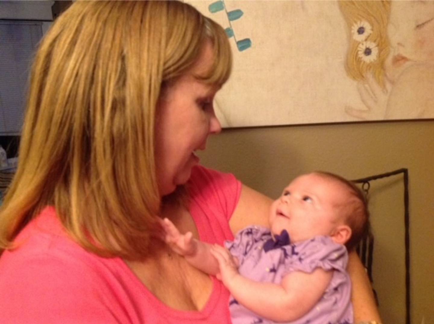 To the reading world, Joliet native Sandy (Adam) Kleinschmit was known as Sandra James and Samantha James, author of 37 romance novels for such publishers as Harlequin and HarperCollins. But she was also a down-to-earth woman who put family first. She is pictured with her granddaughter Lyra.