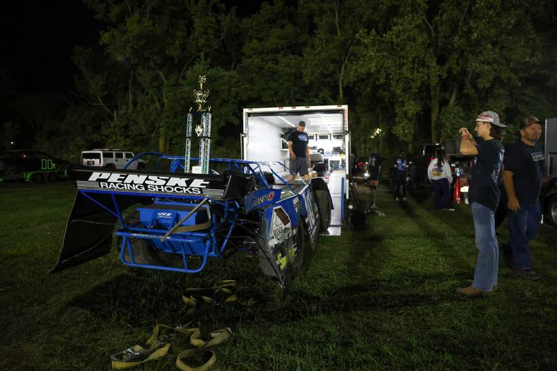 The 2025 Pro Late Model class champion trophy sits on Austin McCarty's race car in the pits after the final night of racing on Friday, Sept. 26, 2025, at the Kankakee County Speedway. McCarty won the title for the second year in a row, earning the McCarty family's 10th overall title following a bittersweet racing season.