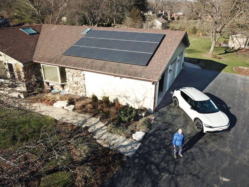 Peter Gorr cites climate change as the reason for installing solar panels on the roof of his Deer Park home. He even charges his electric vehicle with power generated by the solar panels.