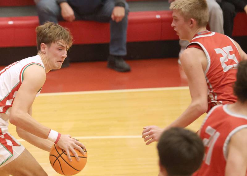 L-P's Jameson Hill looks to cut inside of Streator's Joseph Hoekstra during the Dean Riley Shootin' The Rock Thanksgiving Tournament on Monday Nov. 24, 2025 in Kingman Gymnasium at Ottawa High School.