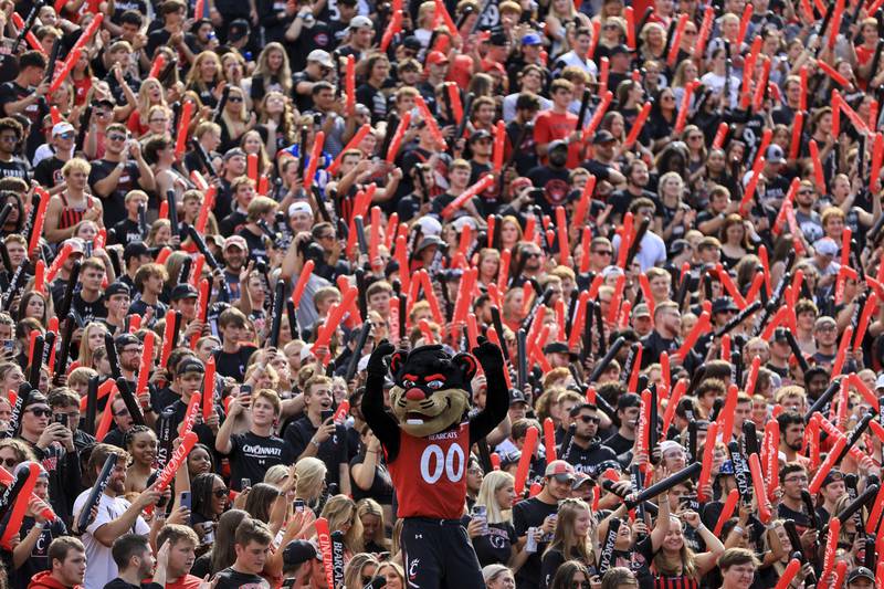Cincinnati mascot The Bearcat performs in the student section during an NCAA college football game against Indiana, Saturday, Sept. 24, 2022, in Cincinnati. Cincinnati won 45-24. (AP Photo/Aaron Doster)
