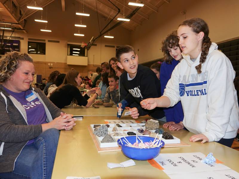 Children play with minerals and rocks seen in Minecraft on Friday, April 19, 2024, at Illinois Valley Community College's SciFest in Oglesby.