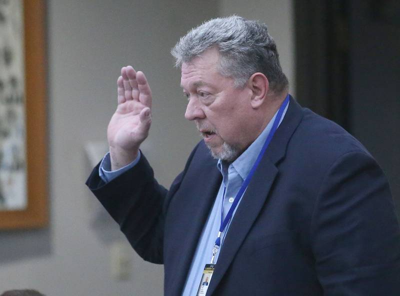 La Salle County Board member James Reid is sworn in during the La Salle County Board Meeting on Thursday, Feb. 13, 2025 at the La Salle County Government Center in Ottawa.