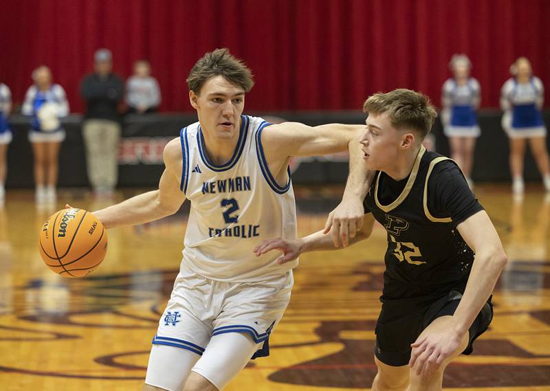 Newman’s Asher Ernst works against Pecatonica’s Conner Berg Tuesday, March 3, 2026, in the 1A sectional semifinal.