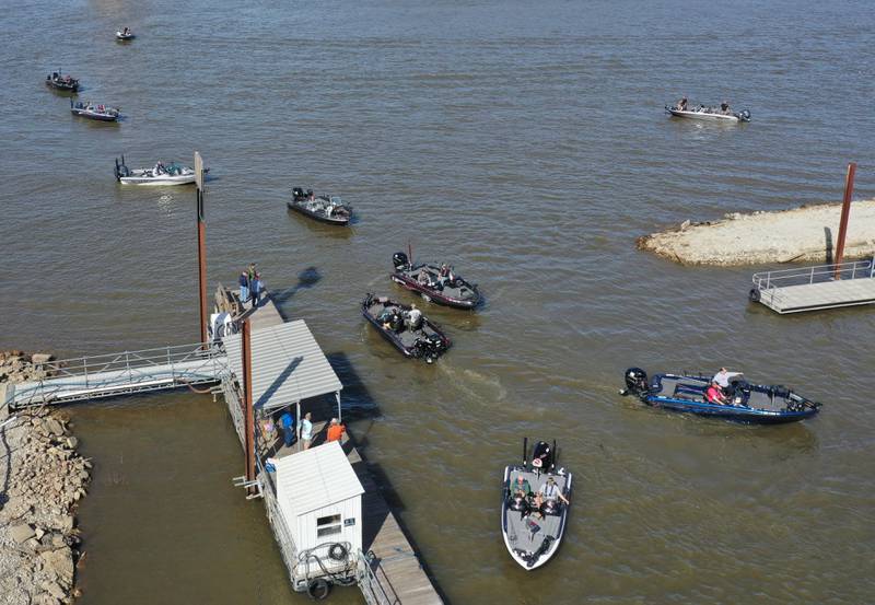 Boats put into the harbor during the annual Masters Walleye Circuit tournament on Friday, March 20, 2026 at the Spring Valley Boat Club.