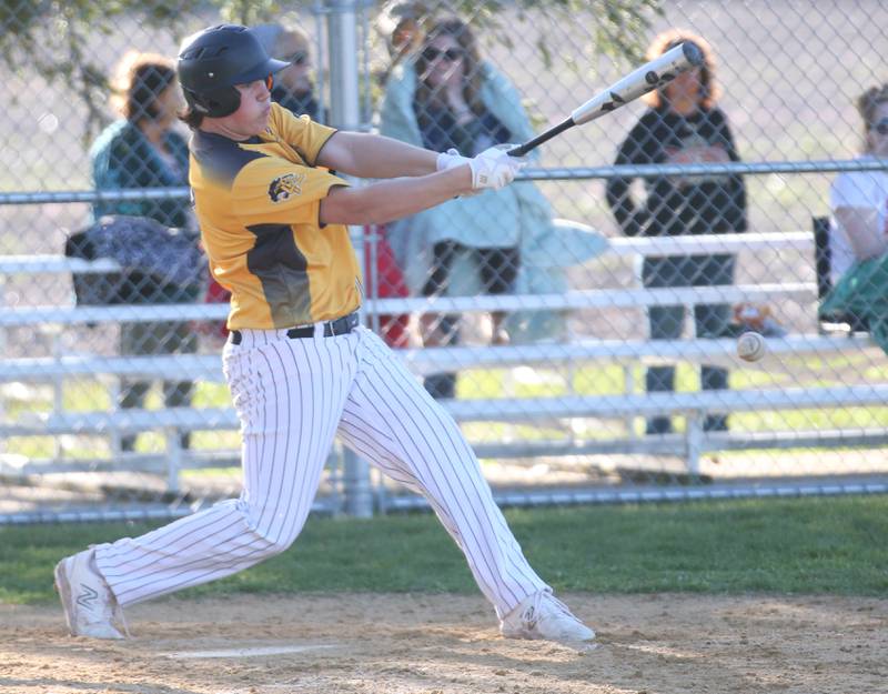 Putnam County's Cameron Spradling connects with a hit against Woodland/Flanagan-Cornell on Tuesday, April 9, 2024 at Woodland High School.