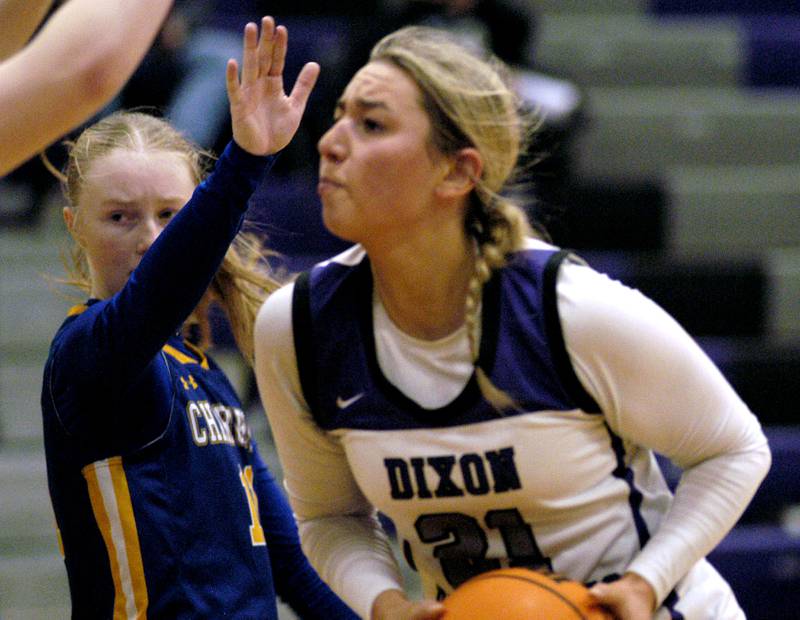 Dixon's  Reese   Dambman drives to the basket.. The Dixon Duchesses played  the Aurora Central Catholic Chargers in the Dixon Holiday Tournament at Dixon High School on Friday, December 26th, 2025