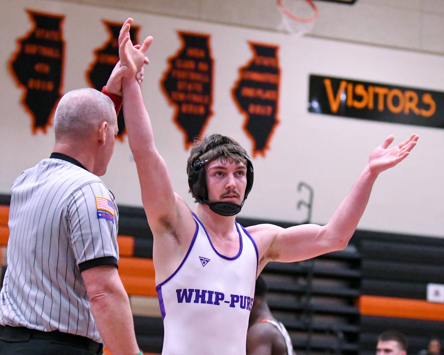 Hampshire’s Michael Branningan celebrates his regional championship over DeKalb’s Malik warren during the 157-weight class in the first-place regional title match on Saturday Jan. 31, 2026, held at DeKalb High School.