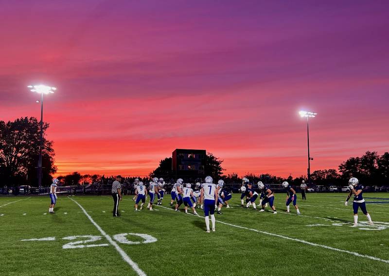 The Princeton Tigers and Monmouth-Roseville kicked off under a picturesque sunset Friday night in Monmouth. The Titans upset the No. 3 ranked Tigers 31-3.