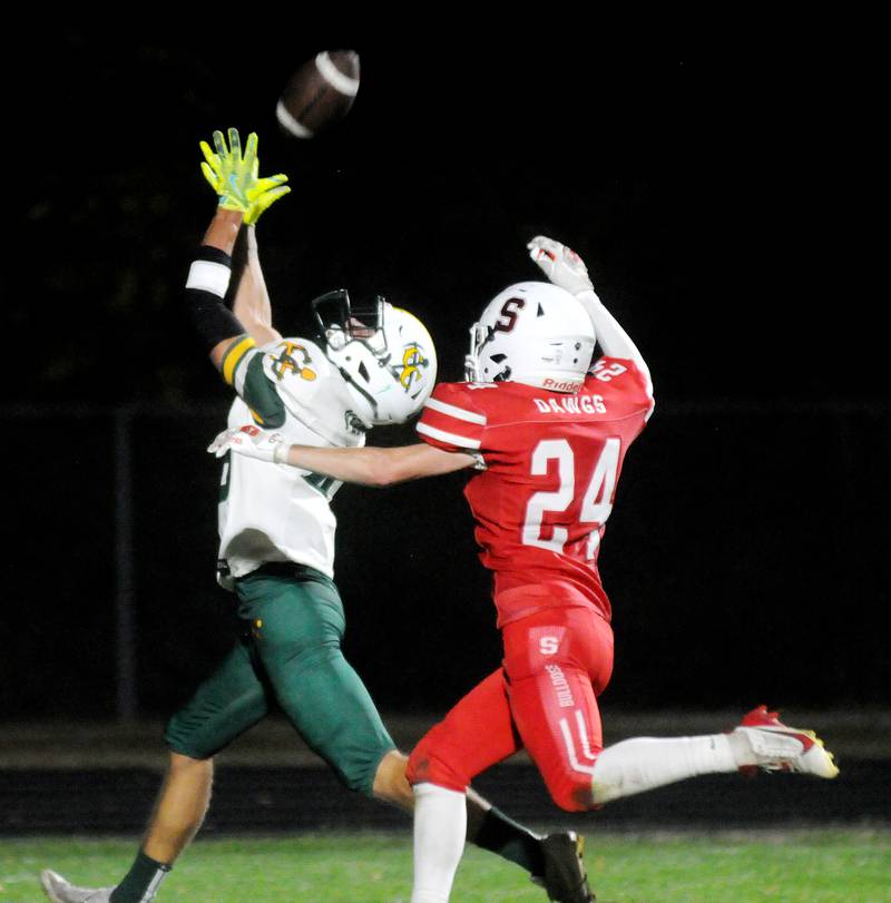 Coal City's Gaven Vestal receives a touchdown pass as Streator's Quintin Stevens (24) defends Friday, Sept. 19, 2025 at Doug Dieken Stadium.