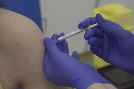 U.S. panel: 1st vaccines to health care workers, nursing homes