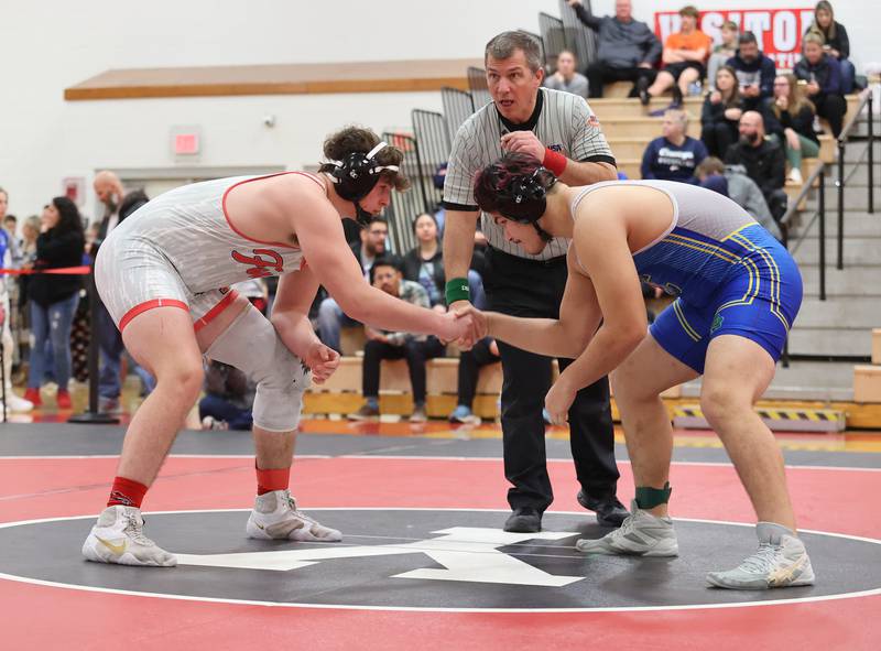 Yorkville's Fenolio goes up against against Joliet Central's Vincencio-Ram during the Southwest Prairie Conference wrestling meet at Yorkville High School on Saturday, Jan. 21, 2023.