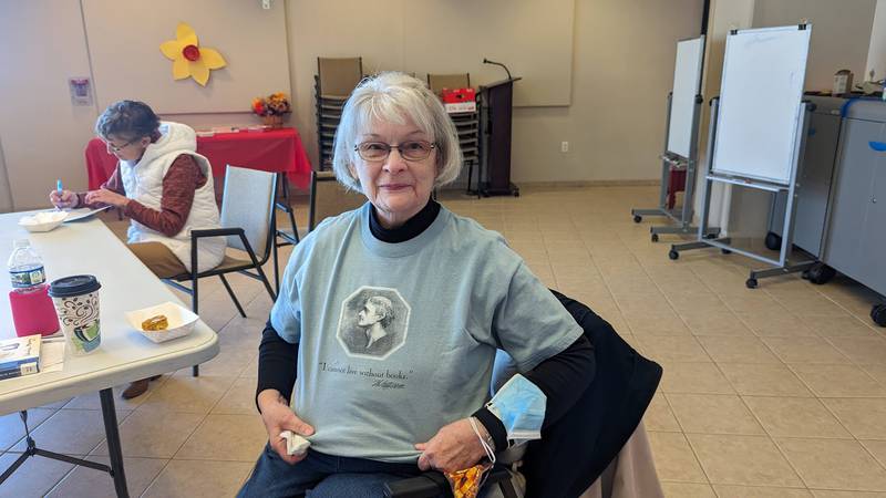 The Joliet Public Library Book Group celebrated its 25th anniversary on Tuesday with bakery from the Book and Bean Café at the Black Road branch, where book group meets. Longtime member Margaret Holzrichter of Joliet said she “must have her books.” She even wore a shirt with a quote from Thomas Jefferson that underscored her point: “I cannot live without books.”