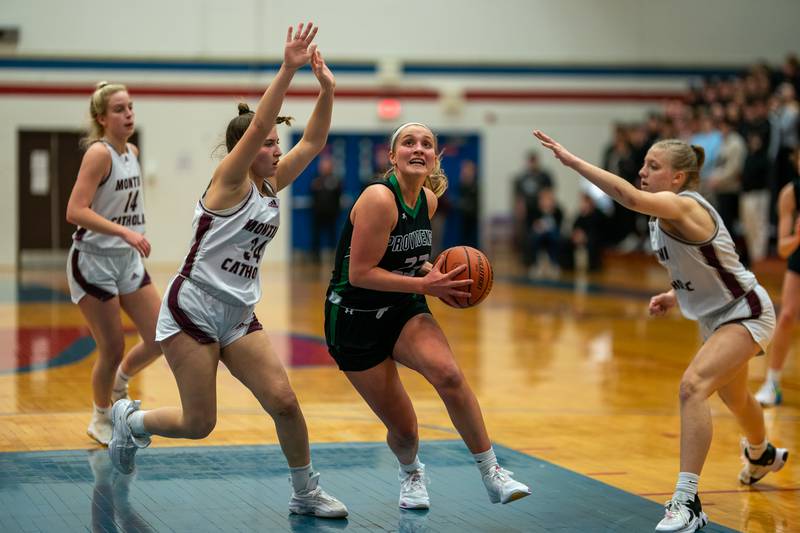 Providence's Annalise Pietrzyk (23) drives to the basket against Montini during the 3A Glenbard South Sectional basketball final at Glenbard South High School in Glen Ellyn on Thursday, Feb 23, 2023.