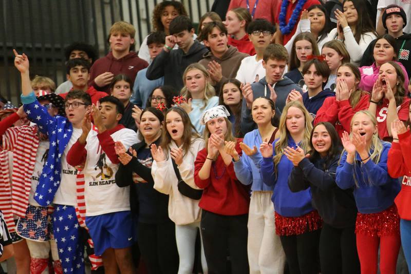 L-P student section cheer on the Cavaliers as they play Morris on Friday, Dec. 6, 2024 in Sellett Gymnasium at L-P High School.