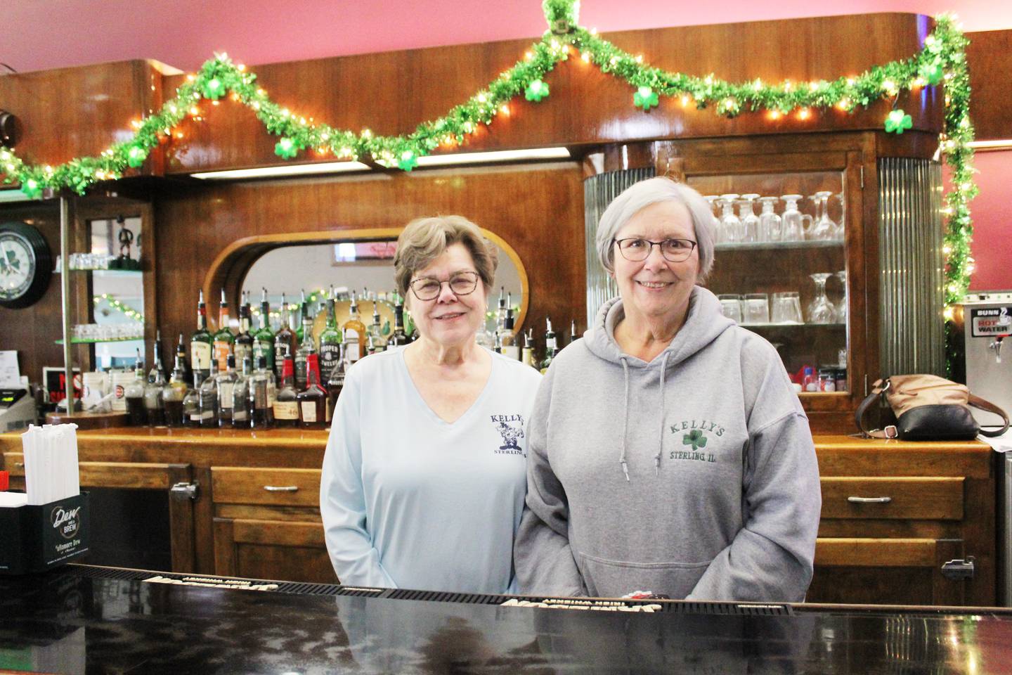 Nancy Kelly-McDonnell (left) and Sally Kelly have owned their family bar and restaurant business, Kelly's, since 1984 in downtown Sterling. The sisters-in-law and Sally's late husband Dan Kelly took over the business from Nancy and Dan's father, Ed Kelly, who owned its previous incarnation, Ed and John's Flamingo Tap, with business partner John Flock when it opened elsewhere downtown in 1952.
