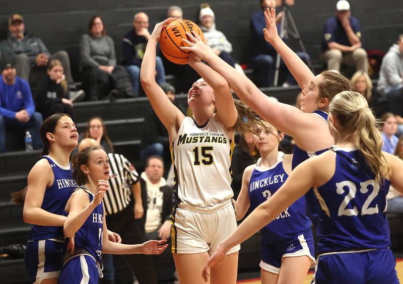Yorkville Christian's Payton Wallin goes up for a shot surrounded by five Hinckley-Big Rock defenders during their Class 1A regional game Tuesday, Feb. 17, 2025, at Indian Creek High School in Shabbona.