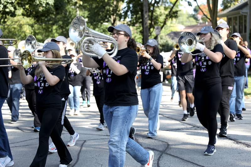The Downers Grove North High School Marching Band performs during the school’s annual homecoming parade on Friday, Sept. 29, 2023.